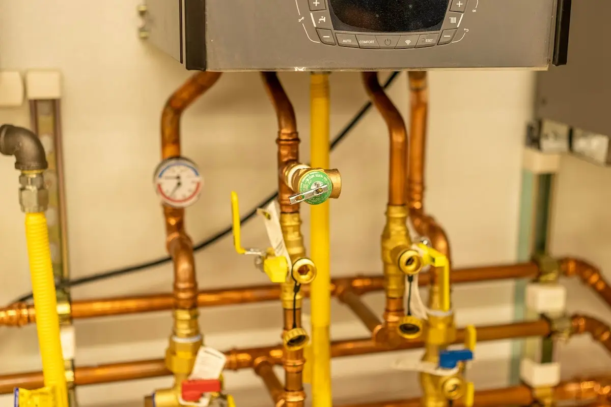 Licensed technician providing Backflow Prevention for a homeowner in Two Rivers